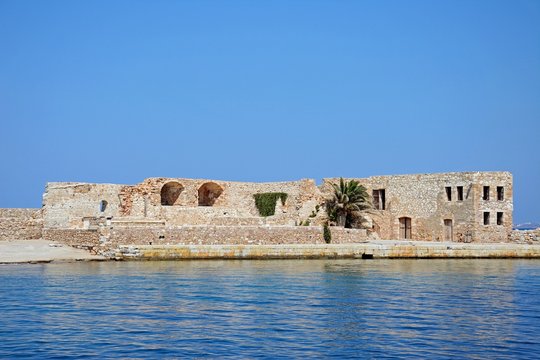 View of the Venetian San Nicolo Bastion along the harbour wall, Chania, Crete.