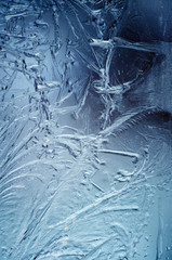 Icy pattern on frozen window.