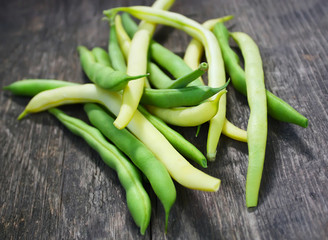 Green beans on a wooden table
