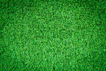 Fototapeta premium Artificial green grass texture, green grass background for golf course, soccer field or sports background concept design.