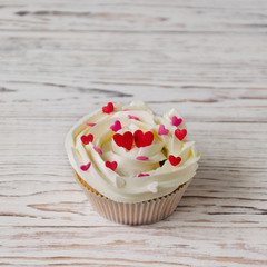 Cupcake decorated with hearts