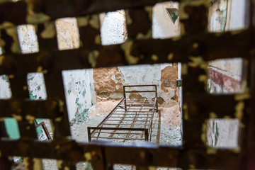 Metal bar door and cell in a prison
