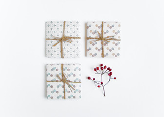 Rustic handmade gift boxes on white background. Top view, flat lay
