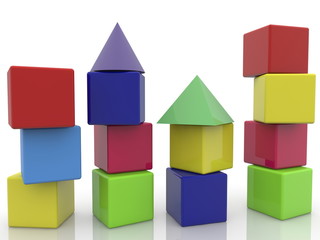 Toy cubes with roofs stacked on white