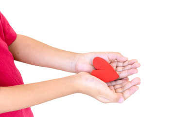 Hands holding red heart isolated on white background.