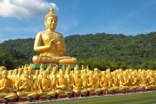 Buddha image of Lord buddha among the 1,250 monks, the symbol of Magha Puja day, Buddha Memorial park, Nakorn nayok, Thailand