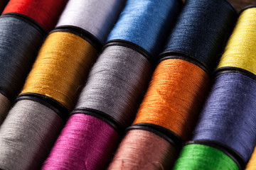 Colorful cotton reels viewed at an angle