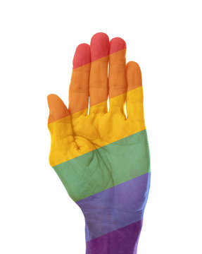 Male hand painted in LGBT flag on white background