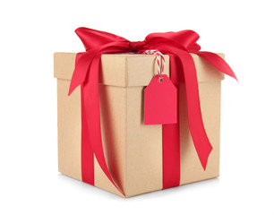 Gift box with ribbon bow and tag on white background