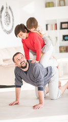 Happy father and son at modern new white home