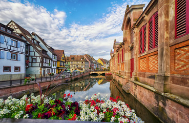 Old French hceoause on the canal embankment. The city of Colmar. Alsace. Fance.