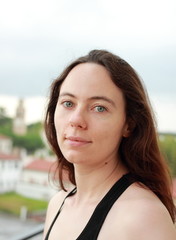 young natural white woman with green big eyes