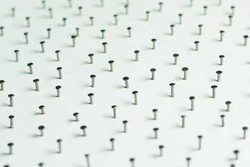 Group of Concrete nails Galvanized dip color on white paper back