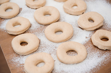 Chef preparing dough - cooking donuts process
