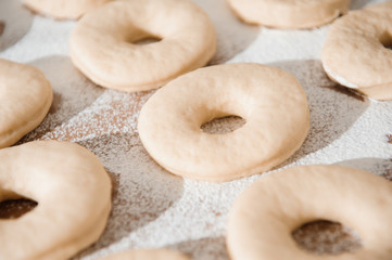 Chef preparing dough - cooking donuts process
