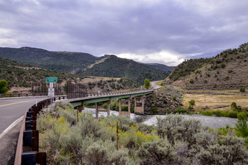 Naklejka premium Colorado State Highway 131 crossing upper Colorado river at State Bridge Bond, Grand County, Colorado, USA