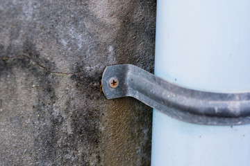 screwdriver in concrete construction