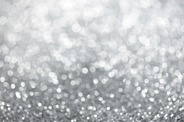 Silver glitter bokeh abstract background.