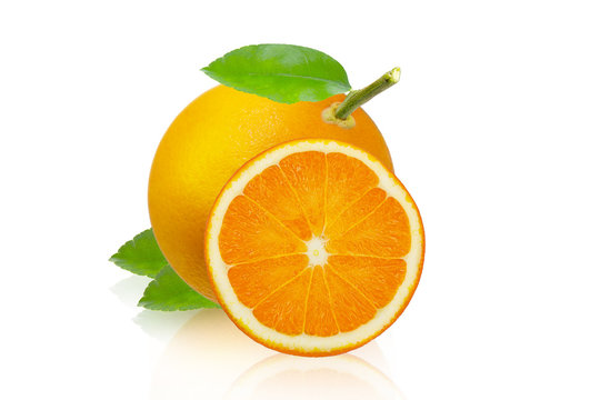 Orange fruit with slice and leaves isolated on white background.