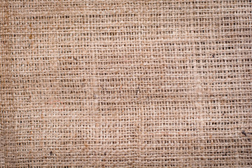 Hessian sackcloth woven texture pattern background in light crea