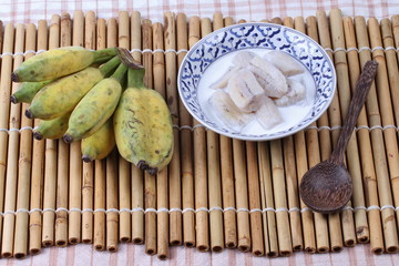 Cultivated banana in coconut milk and wholes of banana.