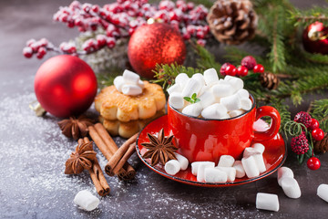 cocoa and cookies about marshmallows and Christmas balls on a table, selective focus, copy space