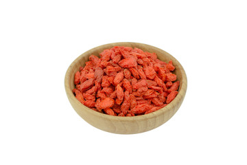 goji berries in wood bowl isolated on white background