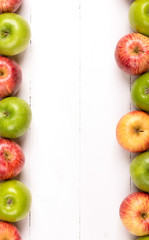 fresh apples on wooden table, rustic style.