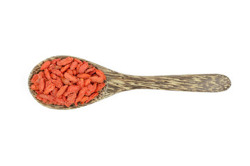 goji berries in wood spoon on white background