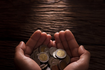 handful of coins background for finance and banking concept.