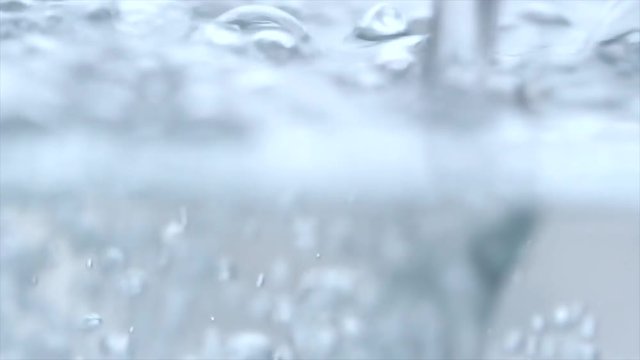 Slow motion shot of water pouring