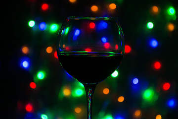 Glass of wine on the background bokeh