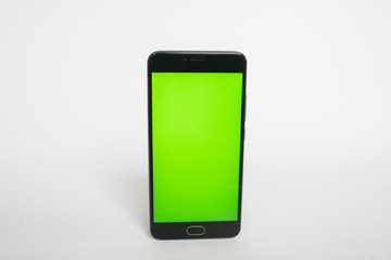 phone in your hands with a green screen for chromakeyer on a white background