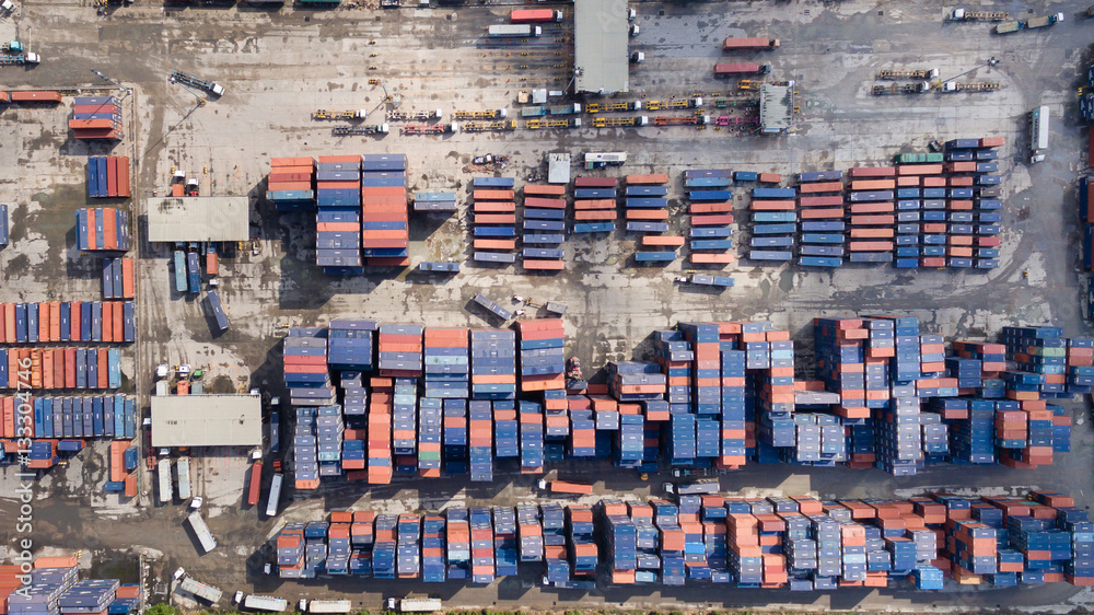 Wall mural Aerial view of cargo containers piled together