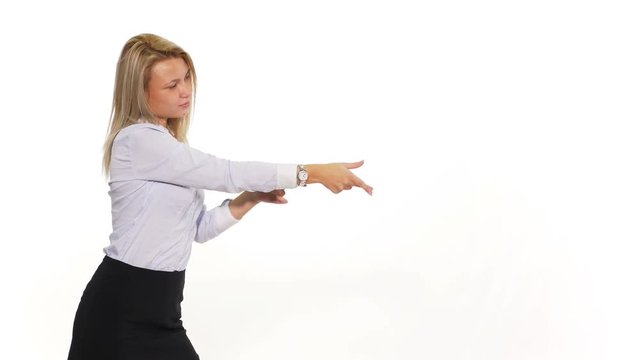 Attractive female pulling an invisible rope and presenting something