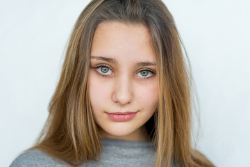 Teenager girl posing on white background isolated