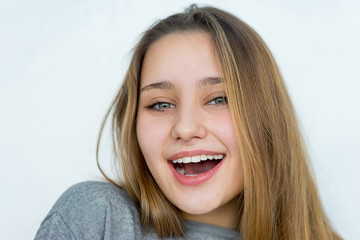 Naklejka premium Teenager girl posing on white background isolated