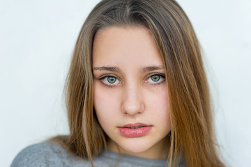 Naklejka premium Teenager girl emotional posing isolated