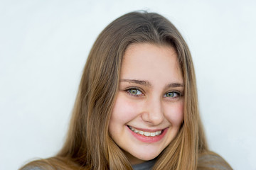 Teenager girl posing on white background isolated