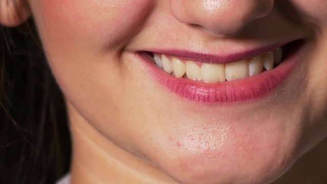 Positive and negative emotions described by woman mouth close up