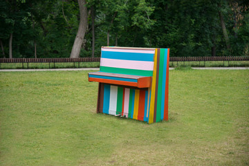 The colorful piano in the meadow