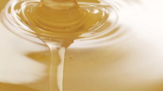 honey poured in bowl in slow motion, 180fps prores footage