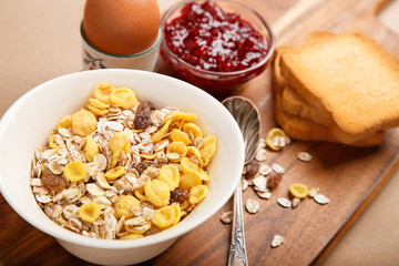 Healthy and natural breakfast. Cereals, jam, egg, toast bread
