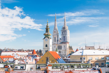 Panoramic view of cathedral in Zagreb, Croatia, from Upper town, winter, snow on roofs