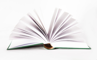 Isolated open book in green cover