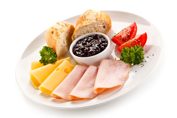 Breakfast - ham, cheese, bread and vegetables