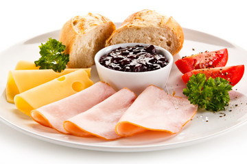 Breakfast - ham, cheese, bread and vegetables