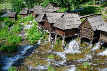 Fototapeta na wymiar Wooden water mills in Jajce - Bosnia and Herzegovina
