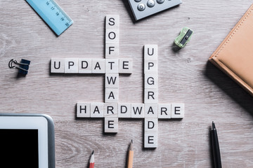 Computer conceptual words collected of game cubes on wooden surface