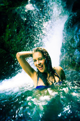 Fototapeta premium Beautiful Lady By The Waterfall